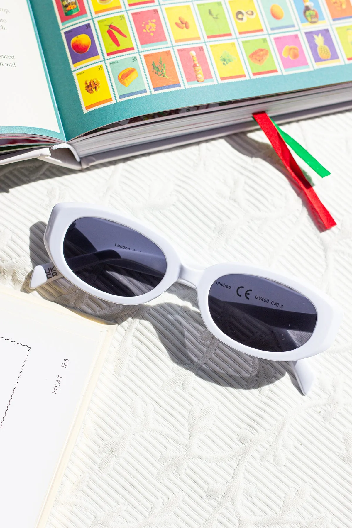 Narrow Oval Cut Edge Sunglasses