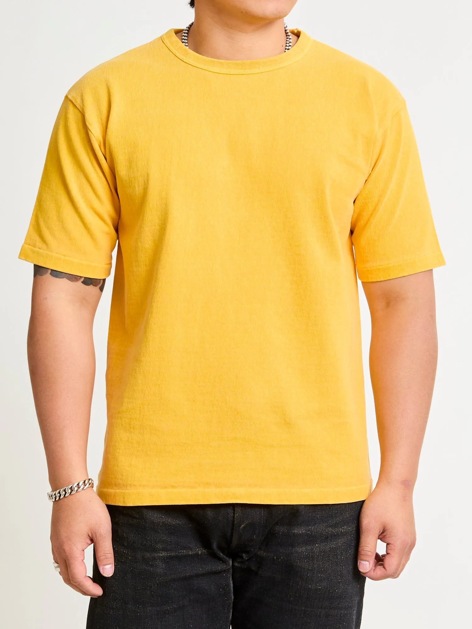 Stand Wheeler Pigment-Dyed T-Shirt in Gold